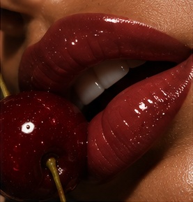 Glossy lips and cherry